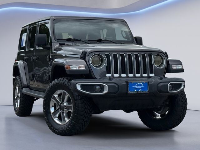 2020 Jeep Wrangler Unlimited Sahara in Granite Crystal Metallic Clearcoat — front three-quarter view