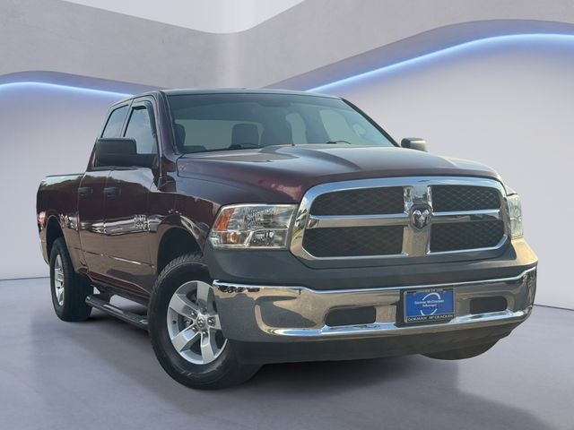 2018 RAM 1500 Tradesman in Delmonico Red Pearlcoat — front three-quarter view